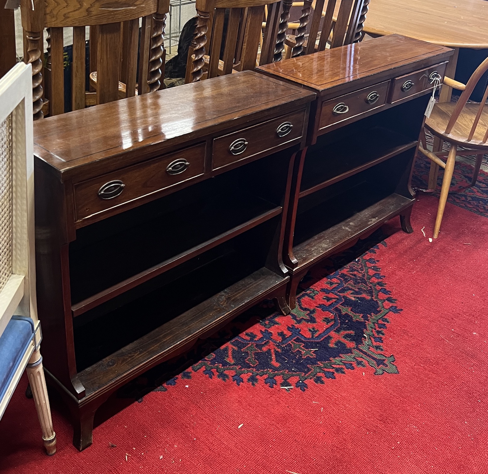 A pair of reproduction George III style mahogany open bookcases, width 80cm, depth 25cm, height 76cm